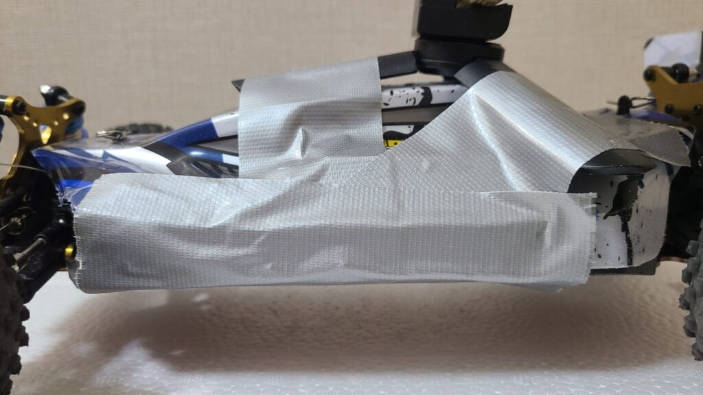 Duct tape side of body shell to chassis for fpv camera